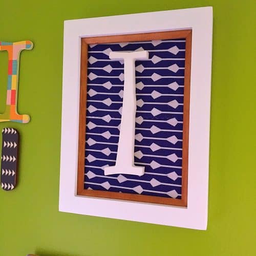 Initial Wall Collage-Fabric and a white letter.