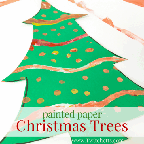 Young kids will love making these painted Christmas trees. With a simple template, your kids can create fun and colorful pieces of Christmas art. #christmastree #christmasart #preschool #kindergarten #artforkids #twitchetts