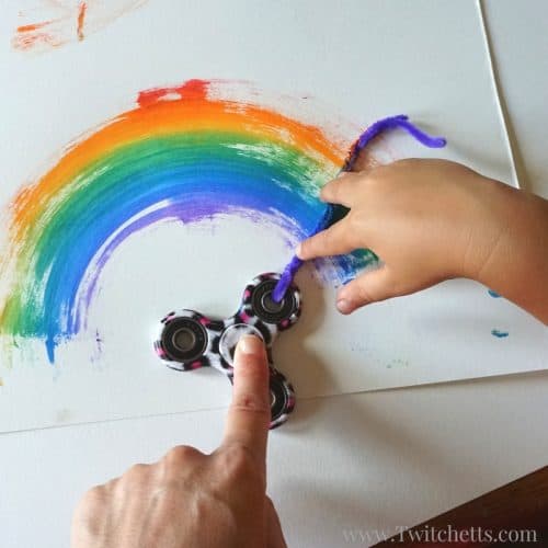 Fun fidget spinner rainbows are an amazing process art. Painting with a fidget spinner is a fun and creative way to use your hand spinner for art.