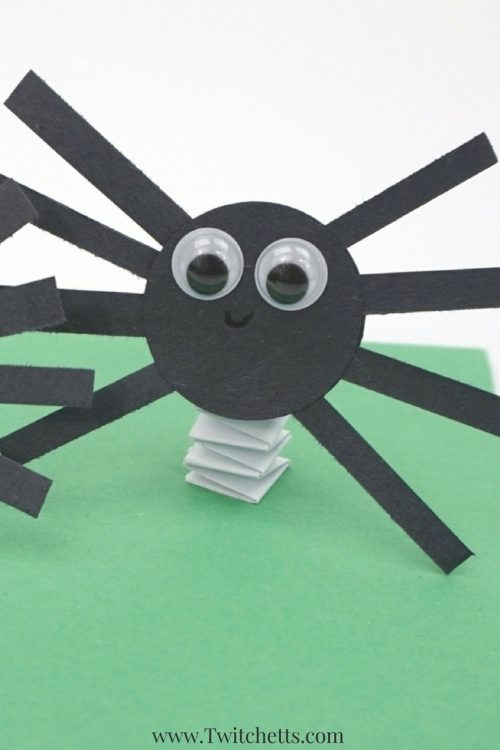 Bouncy construction paper spiders that use up some of your black construction paper. These are fun Halloween crafts for kids. #halloween #paperspiders #spidercraft #craftsforkids #constructionpapercrafts #twitchetts