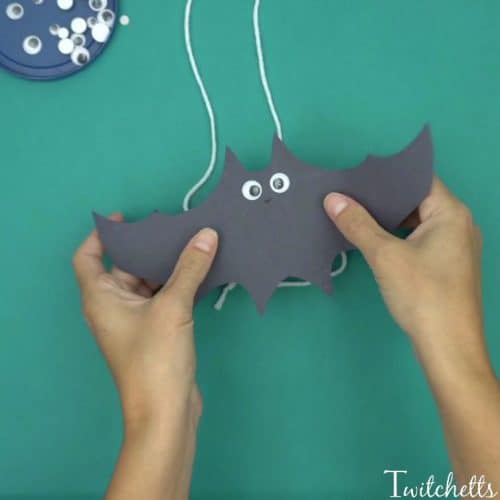Flying Construction Paper Bats ~ Halloween Crafts for Kids. Create flying construction paper bats using black construction paper and toilet paper tubes. This simple craft will lead to kid-approved Halloween bat decorations.