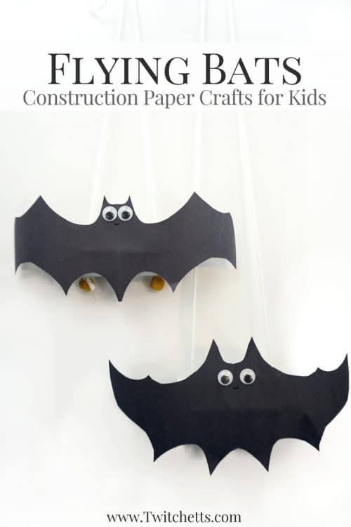 Flying Construction Paper Bats ~ Halloween Crafts for Kids. Create flying construction paper bats using black construction paper and toilet paper tubes. This simple craft will lead to kid-approved Halloween bat decorations. #bats #flyingbats #paperbats #halloween #blackconstructionpaper #batcraft #halloweencraft #constructionpapercraftsforkids #paperfun #halloweenforkids #twitchetts