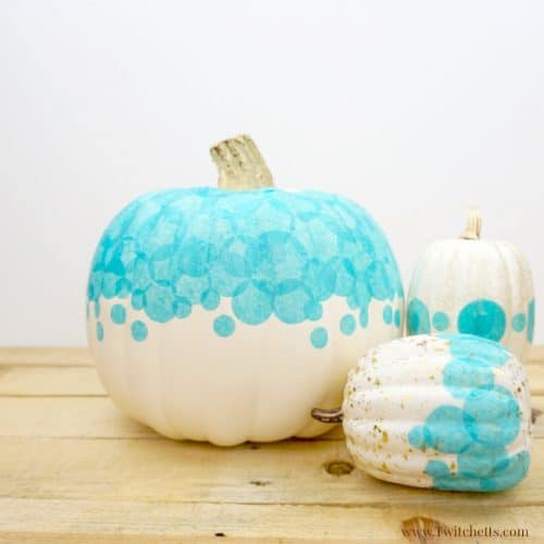 Create a teal tissue paper pumpkin that you can use to decorate your porch this Halloween. Fun teal pumpkin ideas for this year!