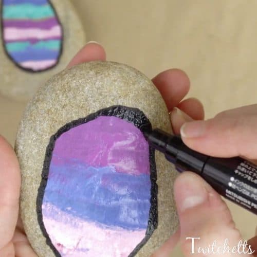 Beautiful and one of a kind Easter rocks. This rock painting idea for kids is a great way for them to make fun Easter egg rocks to hid around town or give to loved ones.
