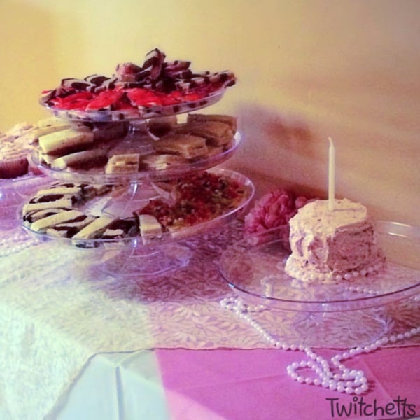This lace and pearls themed party is perfect for a 1st birthday. What better way to celebrate you're little lady than with an elegant 1st birthday party that's easy to put together and will be remembered by your guests.  #twitchetts