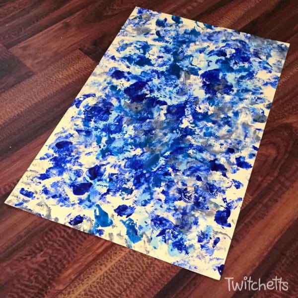Bubble Wrap Art is a therapeutic form of process art for kids.  After a bad day, they can do some bubble wrap painting to cure their bad day.  The results are so cool, you may even want to frame it! #twitchetts #processart #bubblewrap