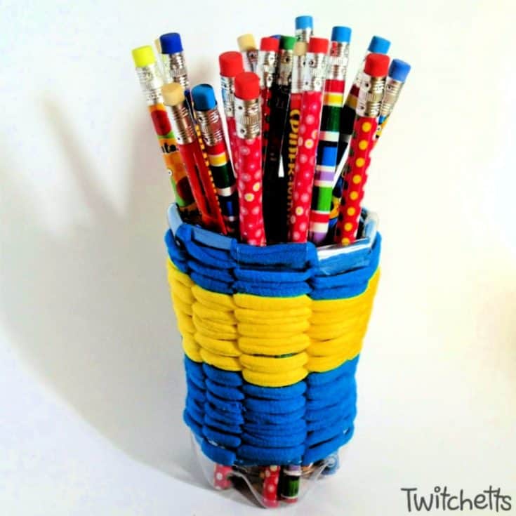 How to make a recycled pencil holder using a plastic bottle and t-shirt yarn. #twitchetts