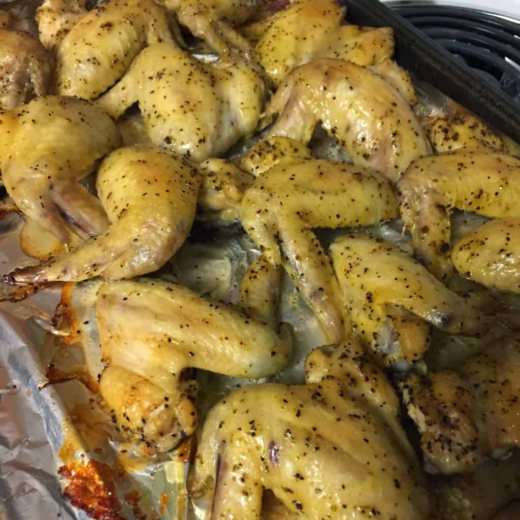 These Baked Chicken Wings are cooked slow and low and finished off with some heat. As football food or a fun dinner, anyone can make this tasty appetizer. 