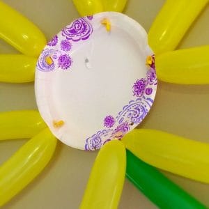 Summer Themed Birthday Celebration. Lots of fun party ideas! How to make a large balloon flower backdrop.