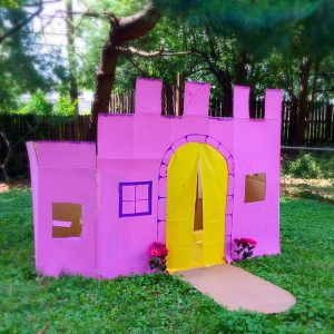 Princess Party 3rd Birthday Ideas. Cardboard Castle and naturally colored cake.