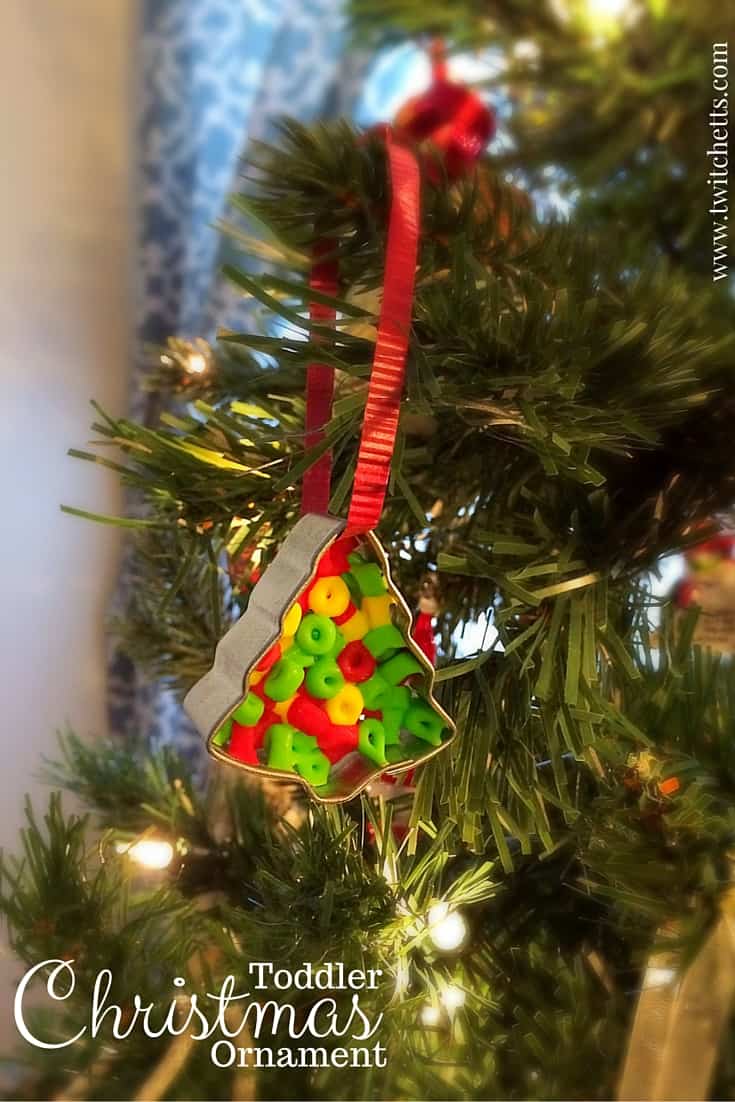 Toddler Christmas Ornament. This simple ornament combines cookie cutter ornaments with bead ornaments to create a fun and unique Christmas ornament that kids can make. A fun gift for your child to craft and give at Christmas.