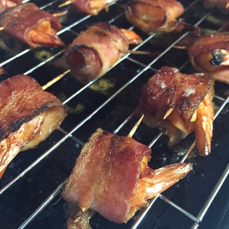 What could be better than bacon wrapped shrimp? When it is broiled in an Amazing sauce. These PiggyBack Shrimp are the perfect appetizer for any party!
