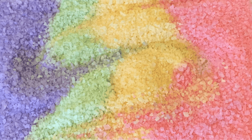 This fun colored salt can be used for sensory play or fun kids crafts. This is a quick toddler activity and the older kids enjoy playing in it too!!