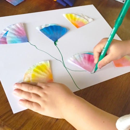 These mini coffee filter flowers are the perfect kids craft. Create water color flowers for a card for Mother's Day or a special Birthday Card. 