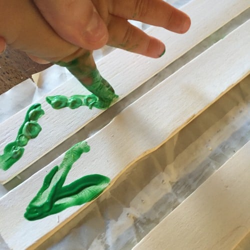 These easy garden markers fun to make with your kids. They will love making these fingerprint garden labels!