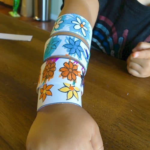 Print off these fun coloring book bracelets for your kiddos. There are 2 different designs and DiY instructions on how to put them together.