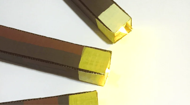Make these DiY Minecraft Torches for your Minecraft fan. Make them for a room decoration, for a Minecraft birthday party, or just a fun craft!