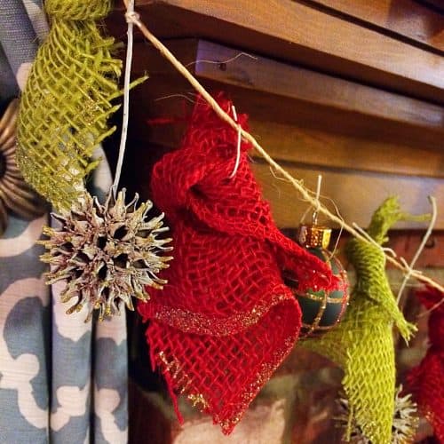 DIY Christmas Garland. Simple rustic and natural garland made from gum balls, inexpensive Christmas ornaments, and burlap.