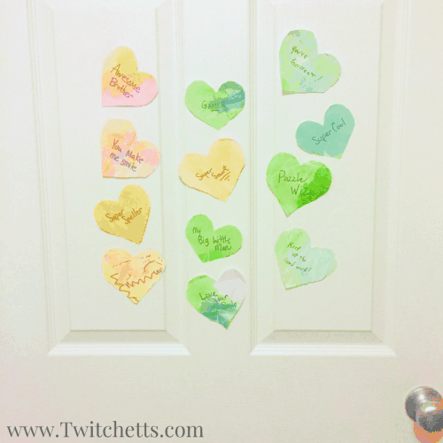 This Valentine's craft is a fun preschool craft. These watercolor hearts make the perfect prop for a fun Valentine's activity for the whole family. 
