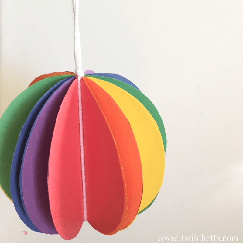 Rainbow Spheres construction paper crafts for kids. These paper spheres are fun to make and cute to have hanging around.