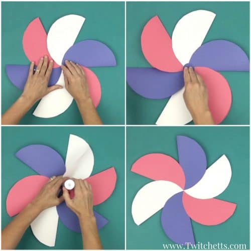Create these amazing giant construction paper flowers in red white and blue.  They are perfect patriotic crafts for kids.  