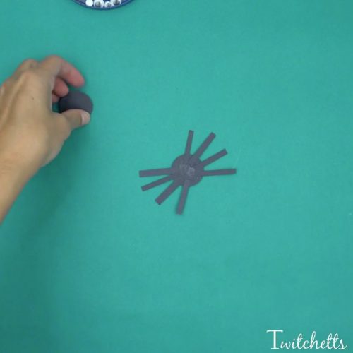 Bouncy construction paper spiders that use up some of your black construction paper. These are fun Halloween crafts for kids.