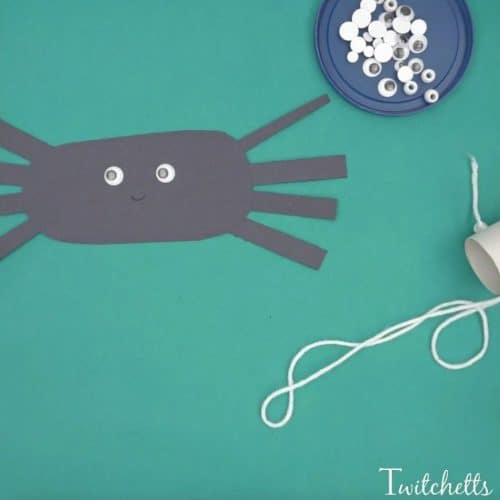 Create climbing construction papers spiders using black construction paper. A fun Halloween kids craft that they can play with when they're finished!