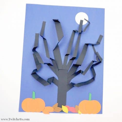 A paper 3D Halloween Tree that perfect for a spooky classroom craft or an afternoon of fun.  Use construction paper to create a cute and creepy paper tree that stands out! #halloween #papertree #3dpapercraft #craftsforkids #spooky #blackconstructionpaper #halloweentree #3dhalloween #constructionpapercraftsforkids #twitchetts