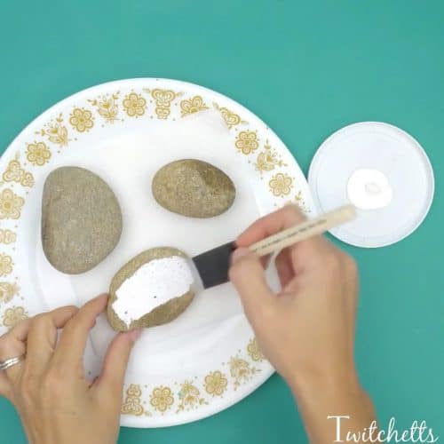 See how easy Christmas painted rocks can be! This fun technique creates fun stone painting projects for kids.