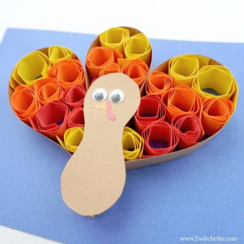 This quilled turkey paper craft is a fun and easy Thanksgiving craft that kids will enjoy creating. This kids craft combines the paper quilling process with construction paper, so it's perfect for a classroom project or for something to create while the turkey is roasting. #turkey #paperturkey #quilledturkey #thanksgiving #craftsforkids #constructionpaper #classroomcraft #twitchetts