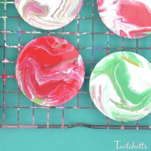 Your kids can create these amazing poured Christmas ornaments. Because pour painting is so unique, each ornament will be unique and amazing!