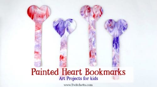 Painted heart bookmarks are perfect non-candy gifts to give this Valentine's Day. Using a fun creative painting art method, you're kids will be so proud to pass these out!