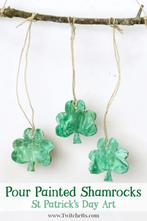 Create a beautiful pour painted shamrock. This one of a kind St Patrick's Day art project will make a fun decoration!