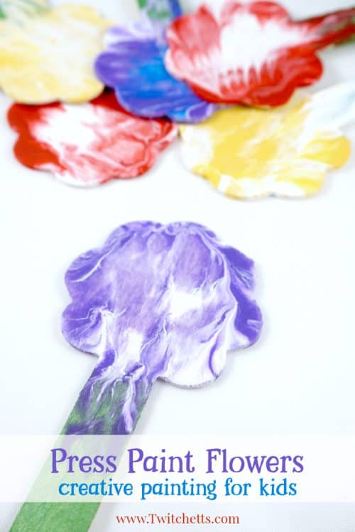 These press painted flowers are an amazing creative painting idea that will create a beautiful, one of a kind, art projects that your child will be proud of.