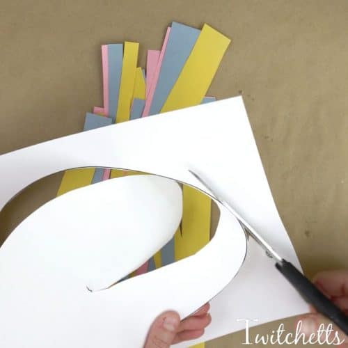 This simple paper Easter egg is the perfect craft for improving your child's scissor skills! From the classroom to the kitchen table, this Easter craft for kids is a fun and quick project.