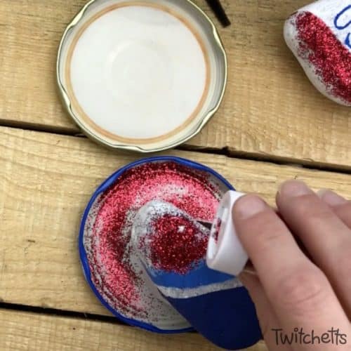 Create these amazing patriotic rocks that sparkle and shine with pride. This rock painting idea for kids is perfect for hiding around town and showing off those red, white, and blues.