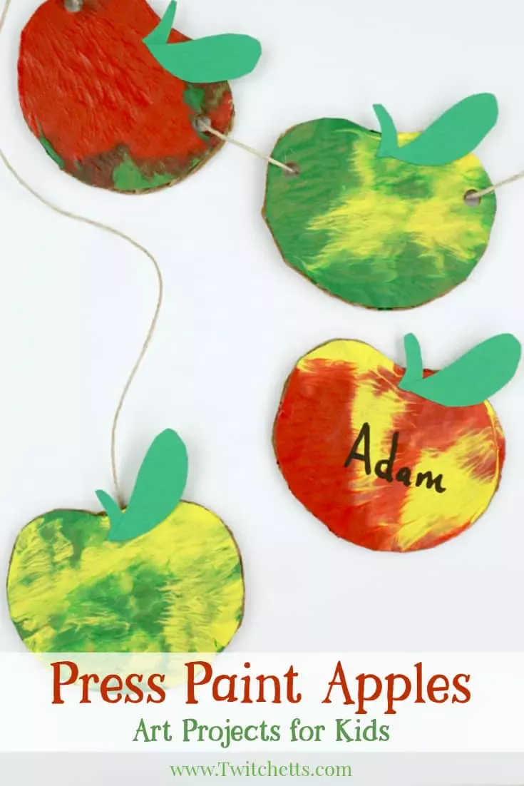 This apple themed press painted garland is so much fun to make! Apples are the perfect way to decorate a classroom for back to school or your living room for fall. Plus your kids will love that can help make them!