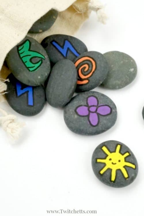 Learn how to make fun memory games out of rocks. They are a travel-ready boredom buster that's kid approved! #memorygame #rocpaintingideas #rockgame #howtomaketravelmemory #travelmemory #rockpaintingideas #giftsfrompaintedrocks #kidsactivities #twitchetts