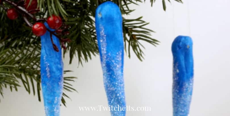 Create fun icicle ornaments using air dry clay. This craft is perfect for kids and adults. They will look lovely hanging from your holiday tree. #icicle #christmasornaments #holiday #winter #clay #kidscrafts #twitchetts