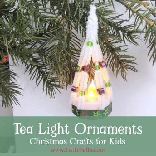 These tea light ornaments are fun for kids to make and look amazing. Create Christmas tree shaped ornaments with tea lights and pipe cleaners. #tealight #chirstmasornament #christmastreeshapedornament #pipecleaner #craftsforkids #Twitchetts