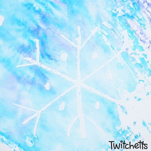 A snowflake art project that is perfect for kids of all ages. We use a fun twist that uses no watercolors. Less mess, more fun! Plus they're learning about color mixing. #snowflake #art #artprojectsforkids @winter #resistpainting #colormixing #preschool #kindergarten #twitchetts