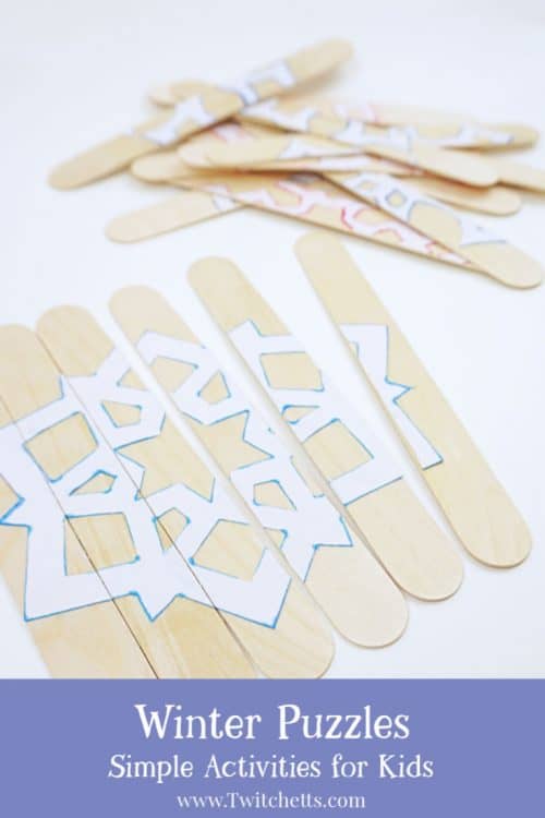 An easy winter puzzle using craft sticks and paper snowflakes. These are great for toddlers, busy bags, car rides, or to hang on your refrigerator while you are making dinner.  #winter #puzzle #snowflake #busybag #carride #roadtrip #activity #toddler #easy #craftstick #howto #twitchetts