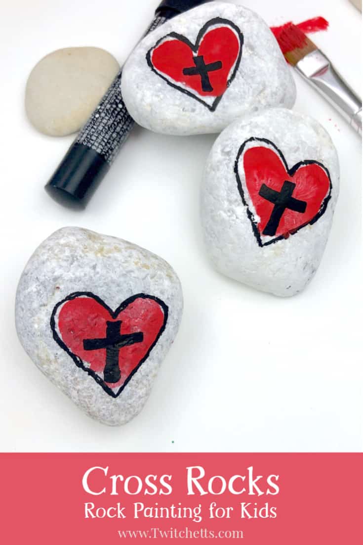 Create easy and fun heart and cross rocks with this simple tutorial. Use fingerprints to create this cross rock painting idea! #twitchetts