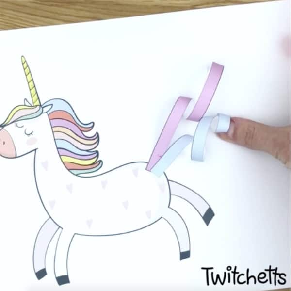 Create a unique paper unicorn with an adorable curly tail. This fun unicorn craft is perfect for birthday parties or just an afternoon of creating with your kids. #twitchetts