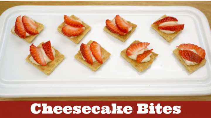 Image of cheesecake bites topped with strawberries. Text reads 