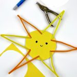 Sun Craft made with pipe cleansers, cardboard, and construction paper. Text Reads: "Cardboard Sun"