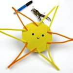 Sun Craft made with pipe cleansers, cardboard, and construction paper. Text Reads: "Pipe Cleaner Sun"