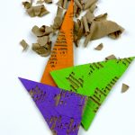 Cardboard triangles painted in secondary colors.