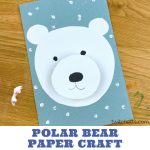 Polar Bear made with construction paper. Text Reads "Polar Bear Paper Craft"