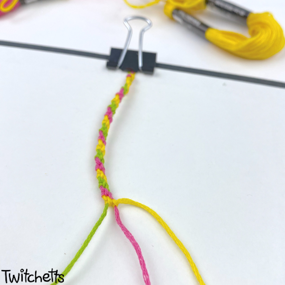 In process image of a candy stripe friendship bracelet